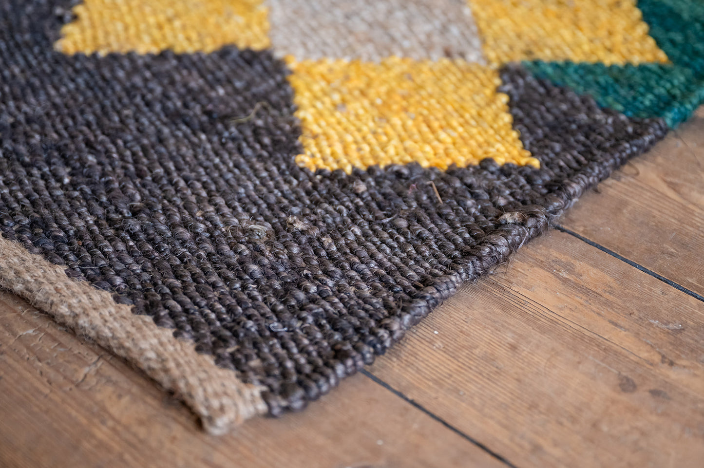 Jute Diamond Rug in Earthy Yellow, Brown and Green.
