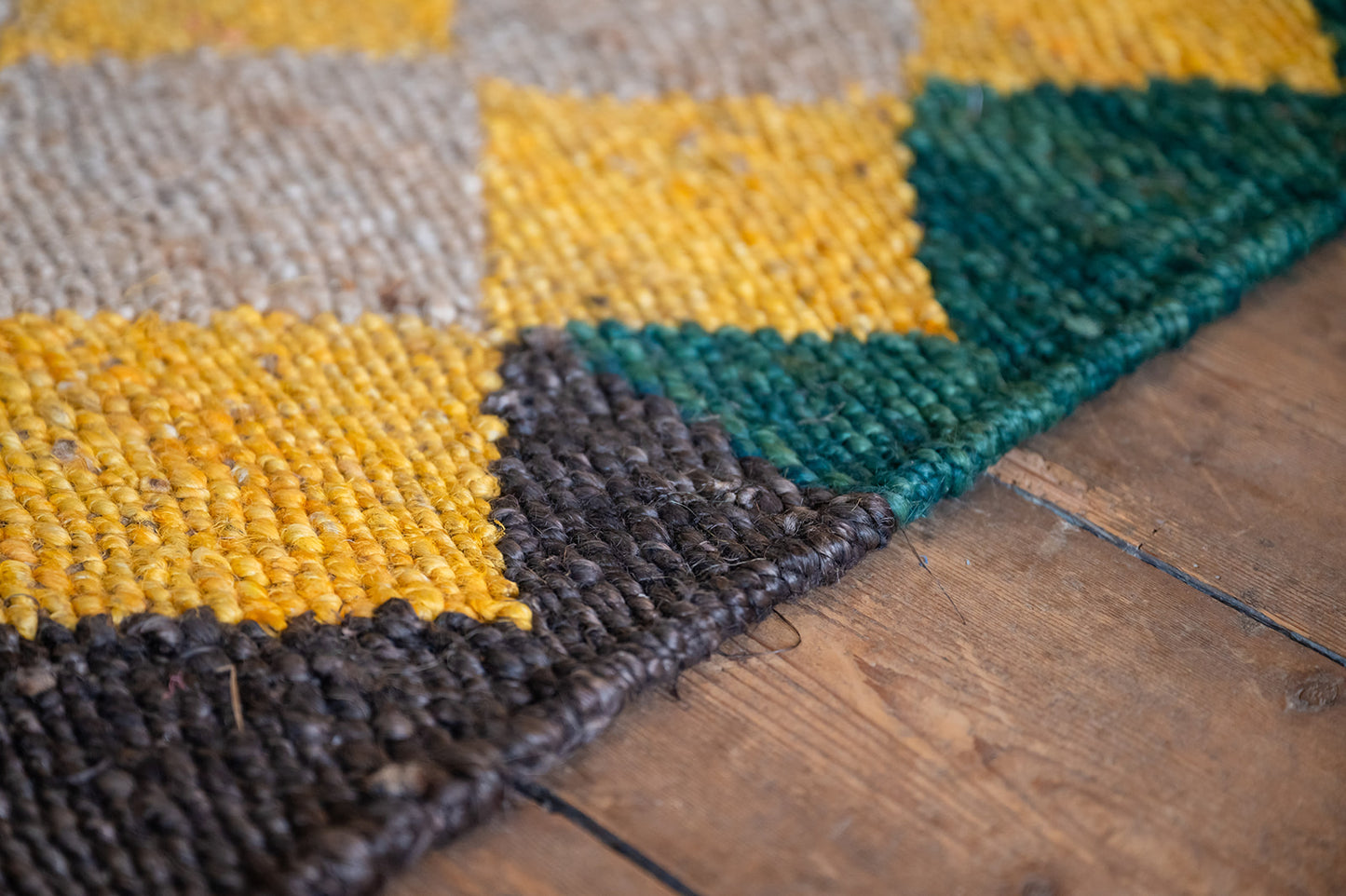 Jute Diamond Rug in Earthy Yellow, Brown and Green.